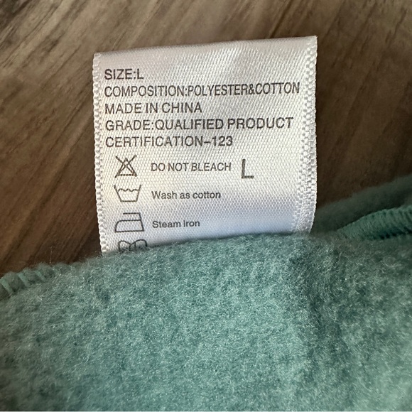 Dog one piece turquoise fleece hoodie.
Size small - Petcircle - Picture 8 of 10